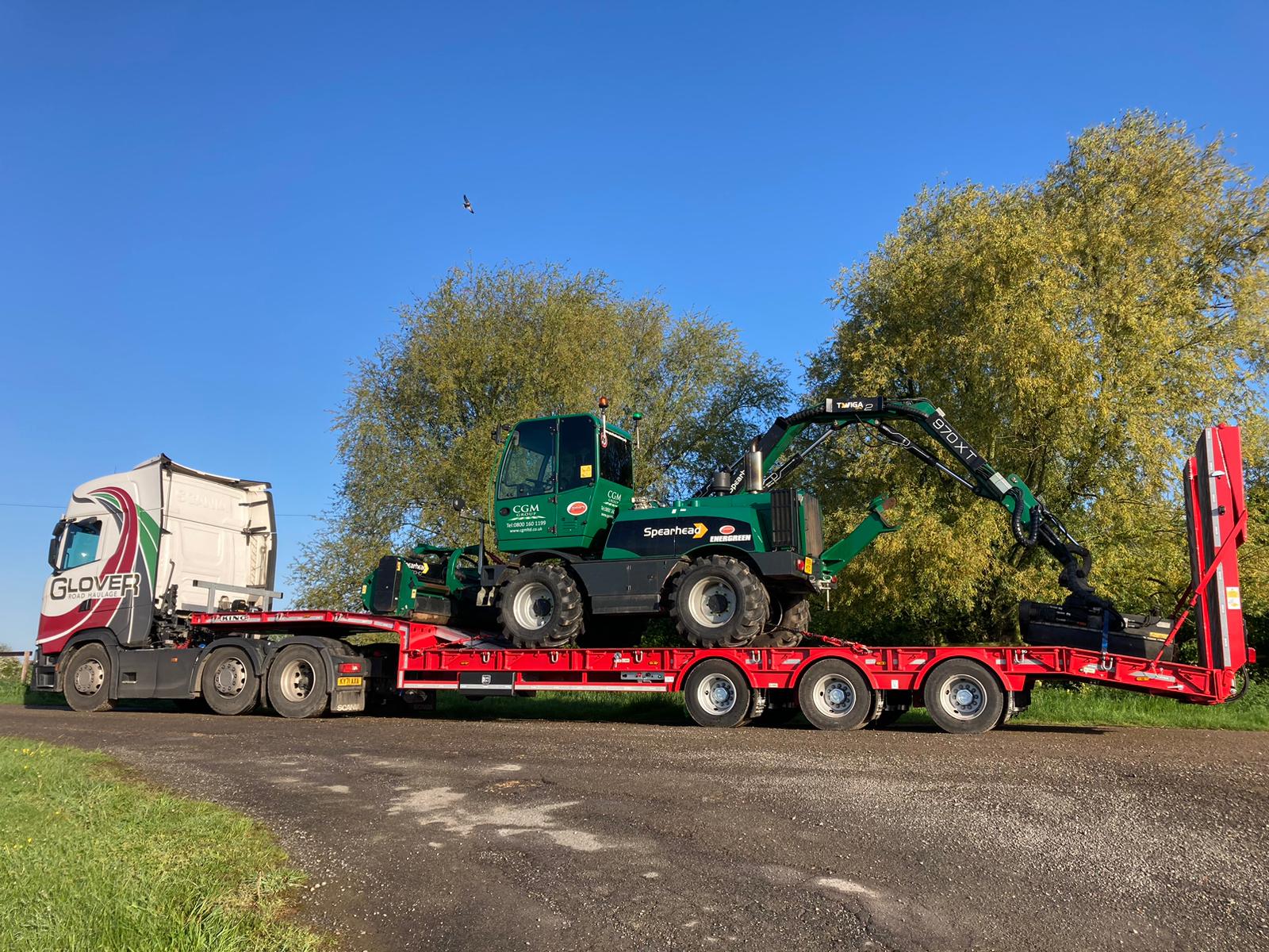 Glover lorry transporting CGM small digger to the site