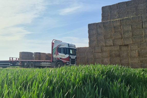 Glover lorry about to be loaded up with hay stacks